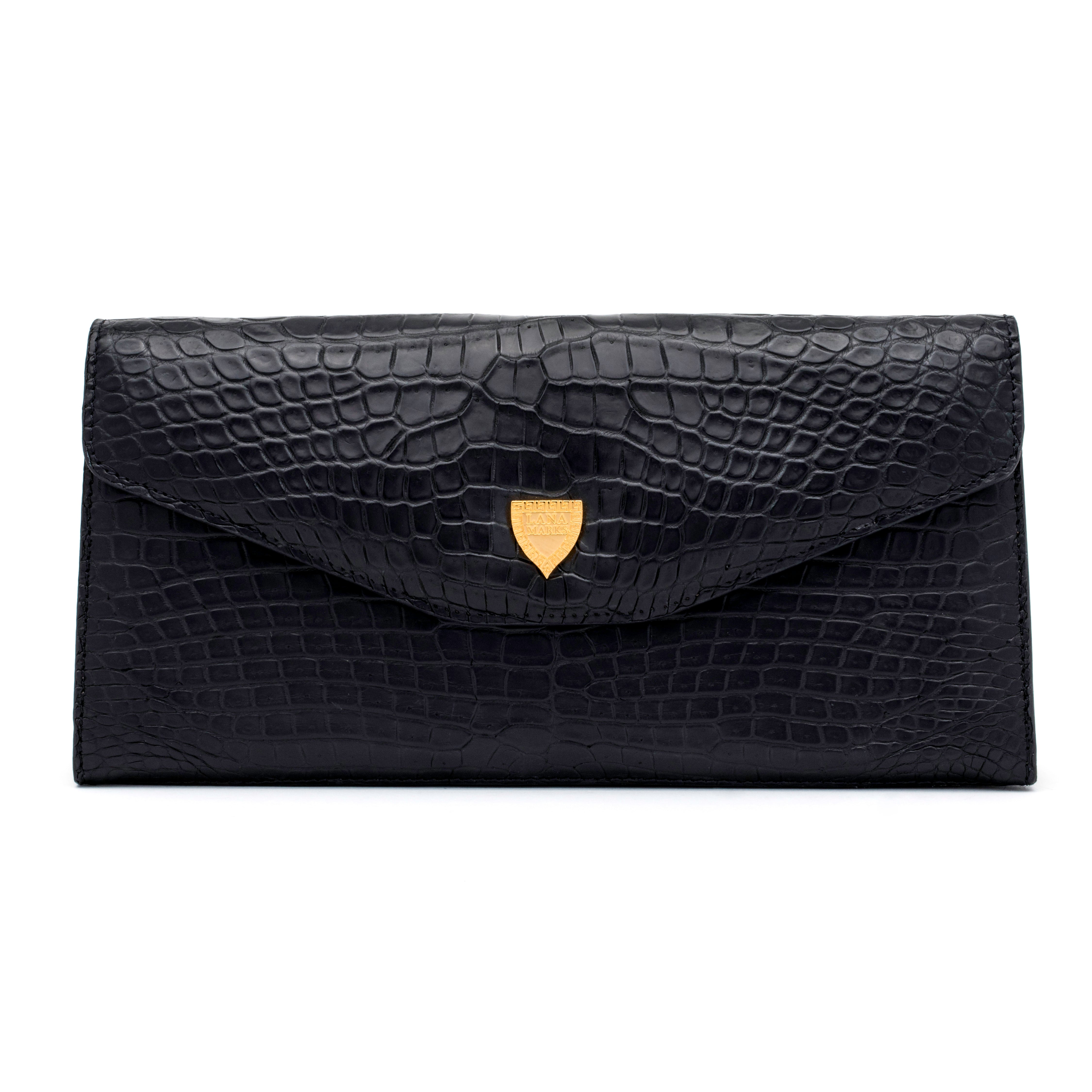 The Rio Clutch Bi-Color in Black and Gold