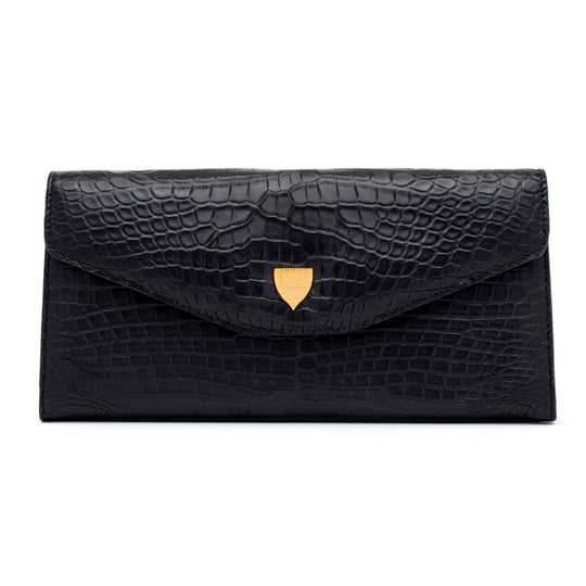 The Rio Clutch Bi-Color in Black and Gold