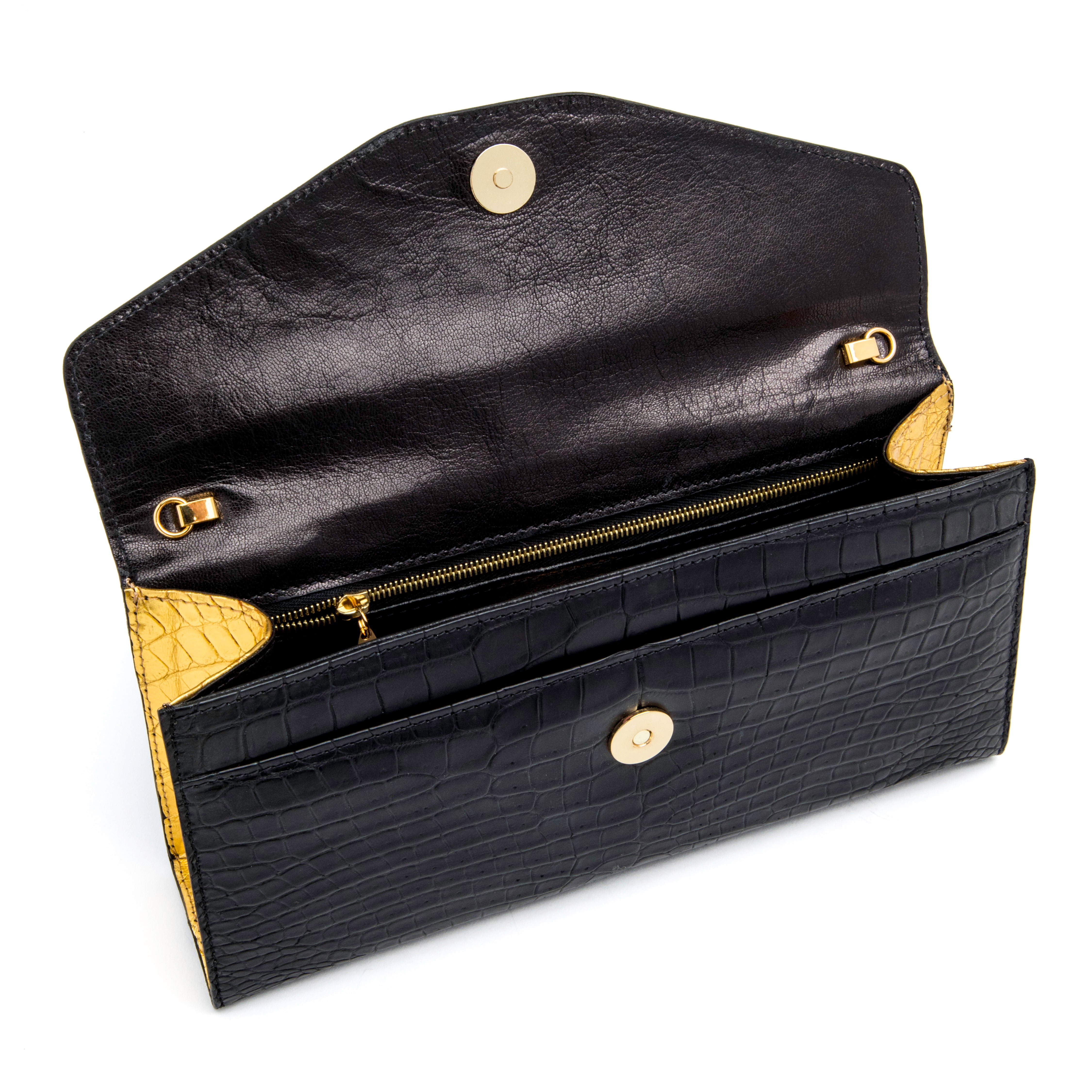 The Rio Clutch Bi-Color in Black and Gold